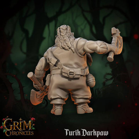 Turik Darkpaw Grim Chronicles figurine from behind, holding axes, against a dark forest background.