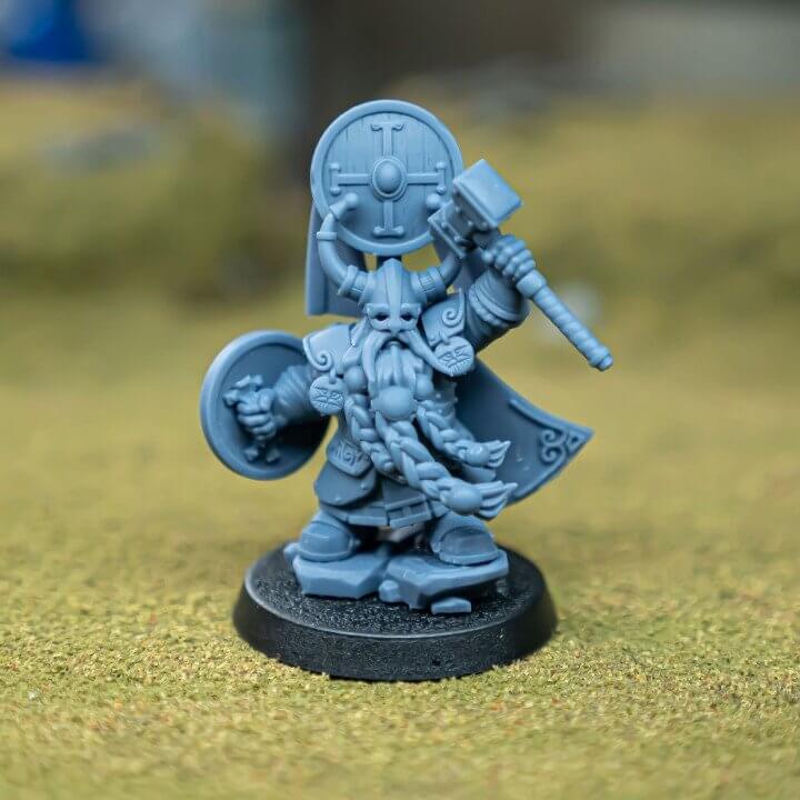 "Highlands Miniatures Dwarf Prince With Hammer And Shield noble leader side angle Border3D LLC"